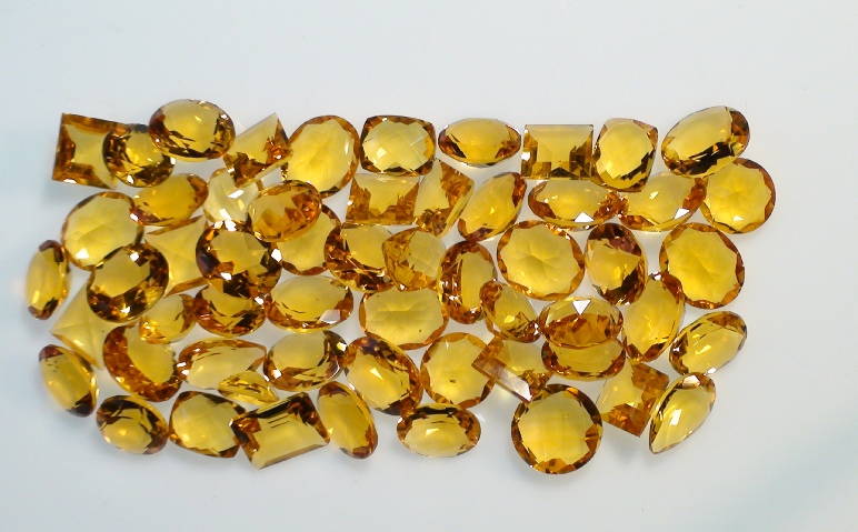 Madeira Citrine Faceted Gemstone Lot of 200 carets on Display