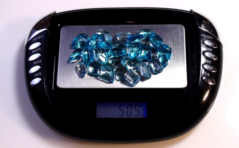 50 caret Parcel of Ocean Blue Topaz on Scale