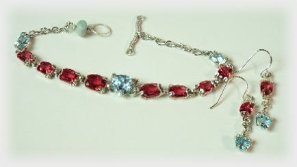 Pink and Blue Topaz Bracelet and Earring Set in silver.