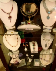 Gemstone Jewelry Necklaces, Bracelets and Rings in Jewelry Cabinet